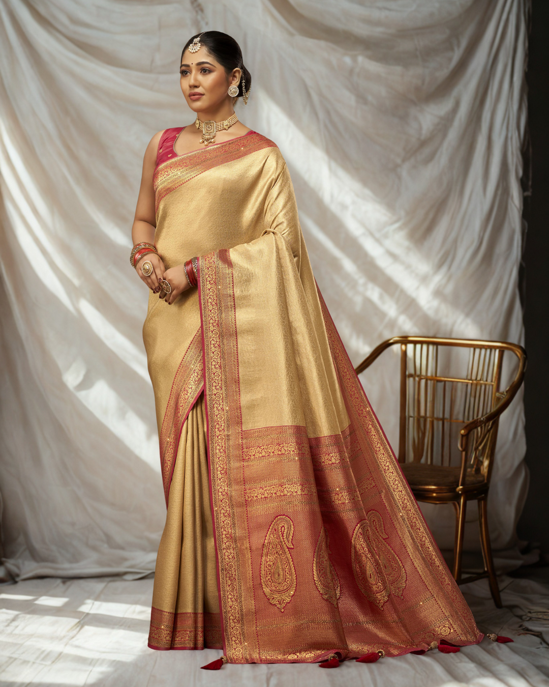 Aadhira – Gold Banarasi Silk Saree with Red Zari Pallu & Paisley Motifs | Fazals