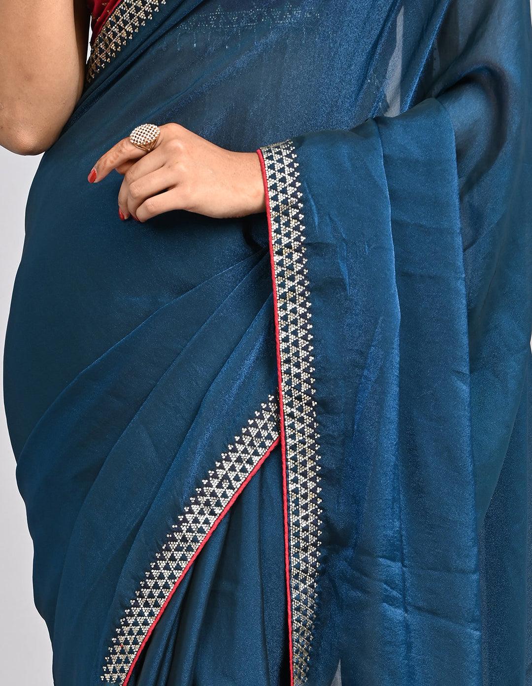 Zehra – Teal Blue Chinnon Saree with Swarovski Stone Border & Contrast Embroidered Blouse | Fazals (45073)