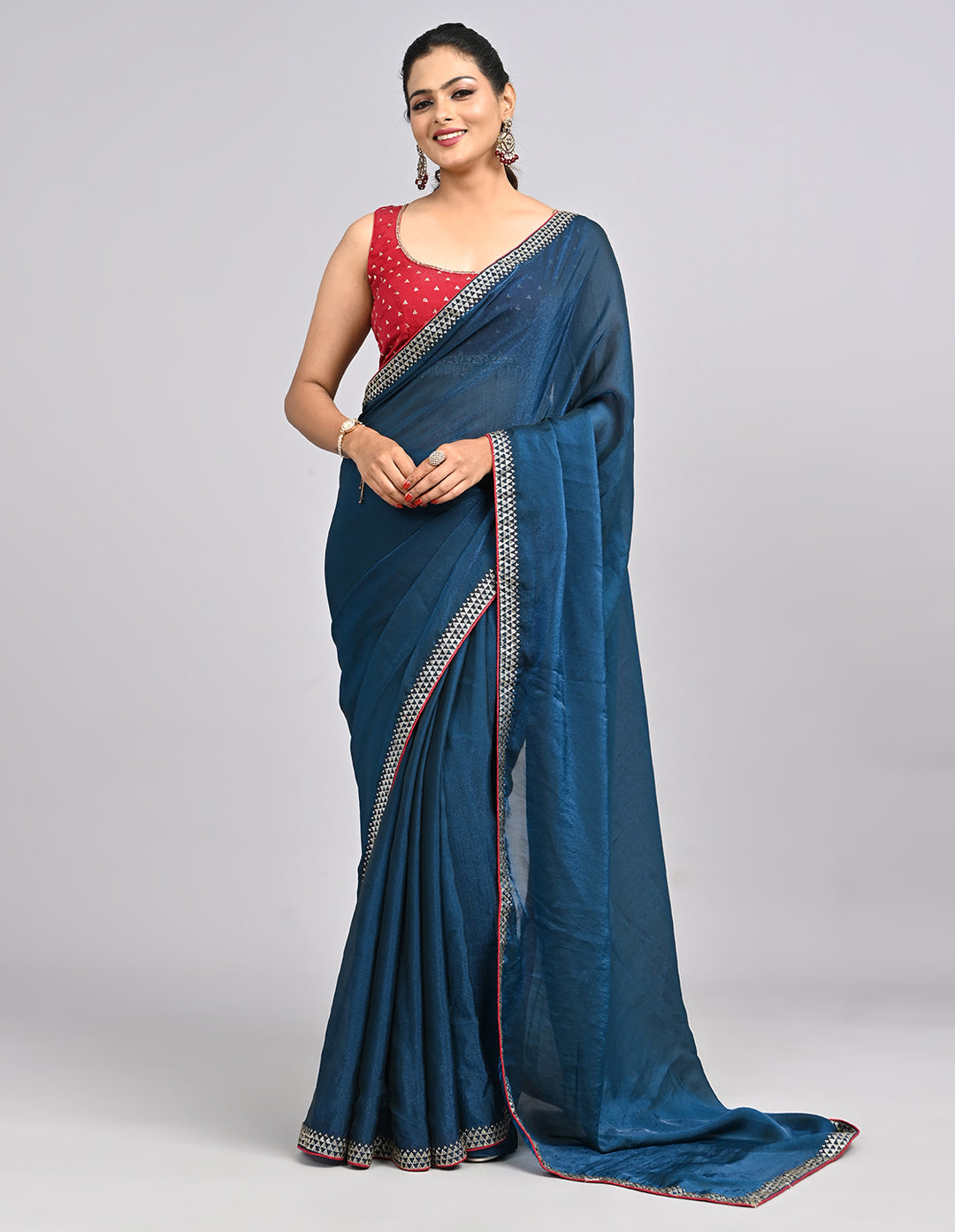 Zehra – Teal Blue Chinnon Saree with Swarovski Stone Border & Contrast Embroidered Blouse | Fazals