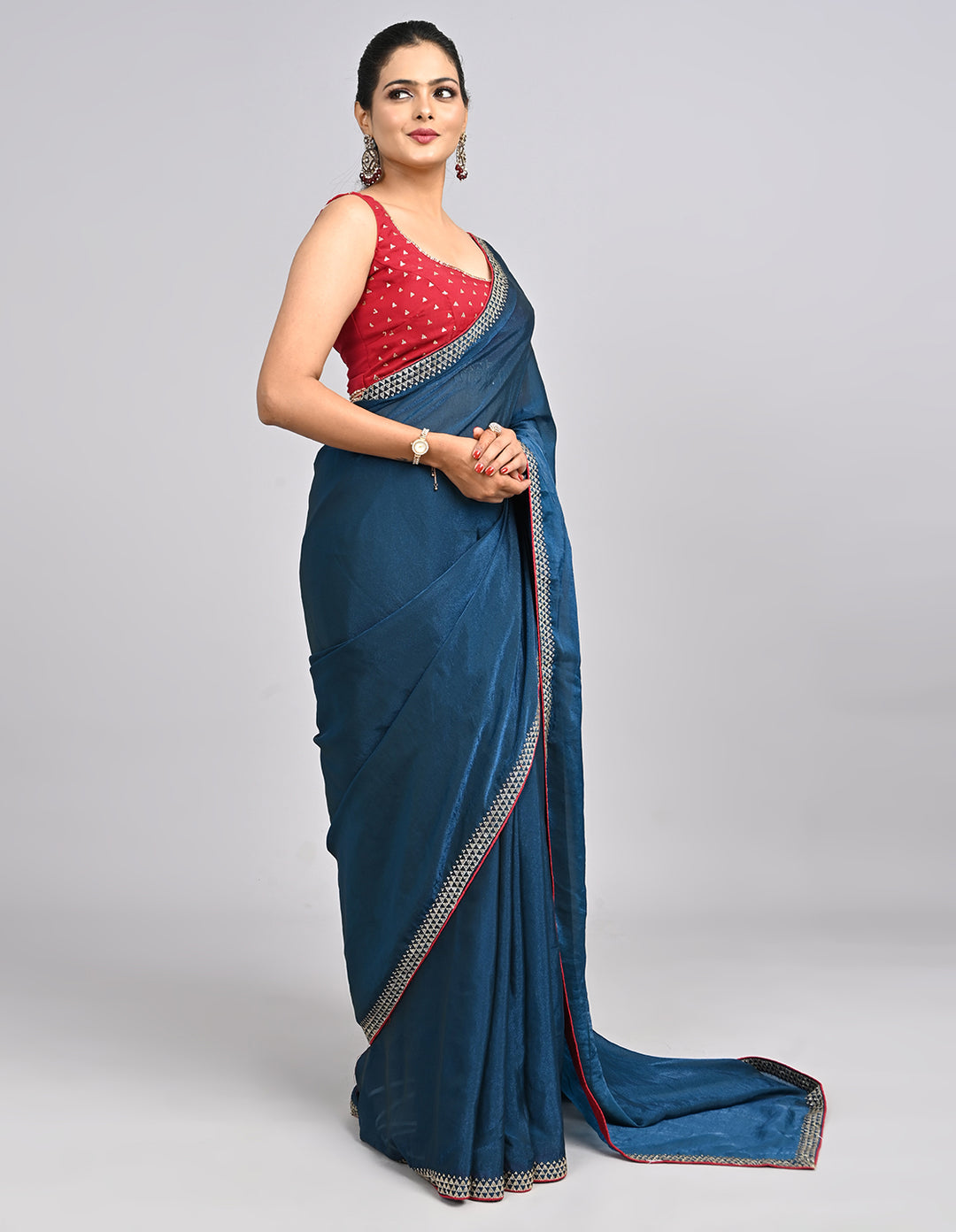 Zehra – Teal Blue Chinnon Saree with Swarovski Stone Border & Contrast Embroidered Blouse | Fazals