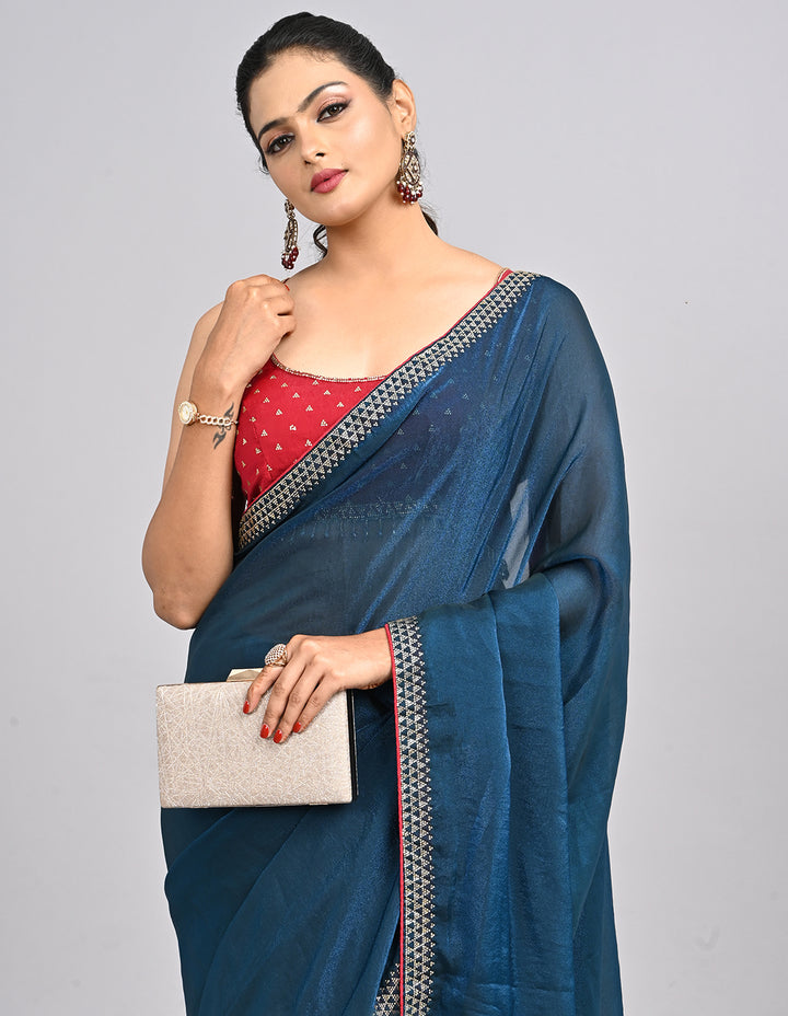Zehra – Teal Blue Chinnon Saree with Swarovski Stone Border & Contrast Embroidered Blouse | Fazals