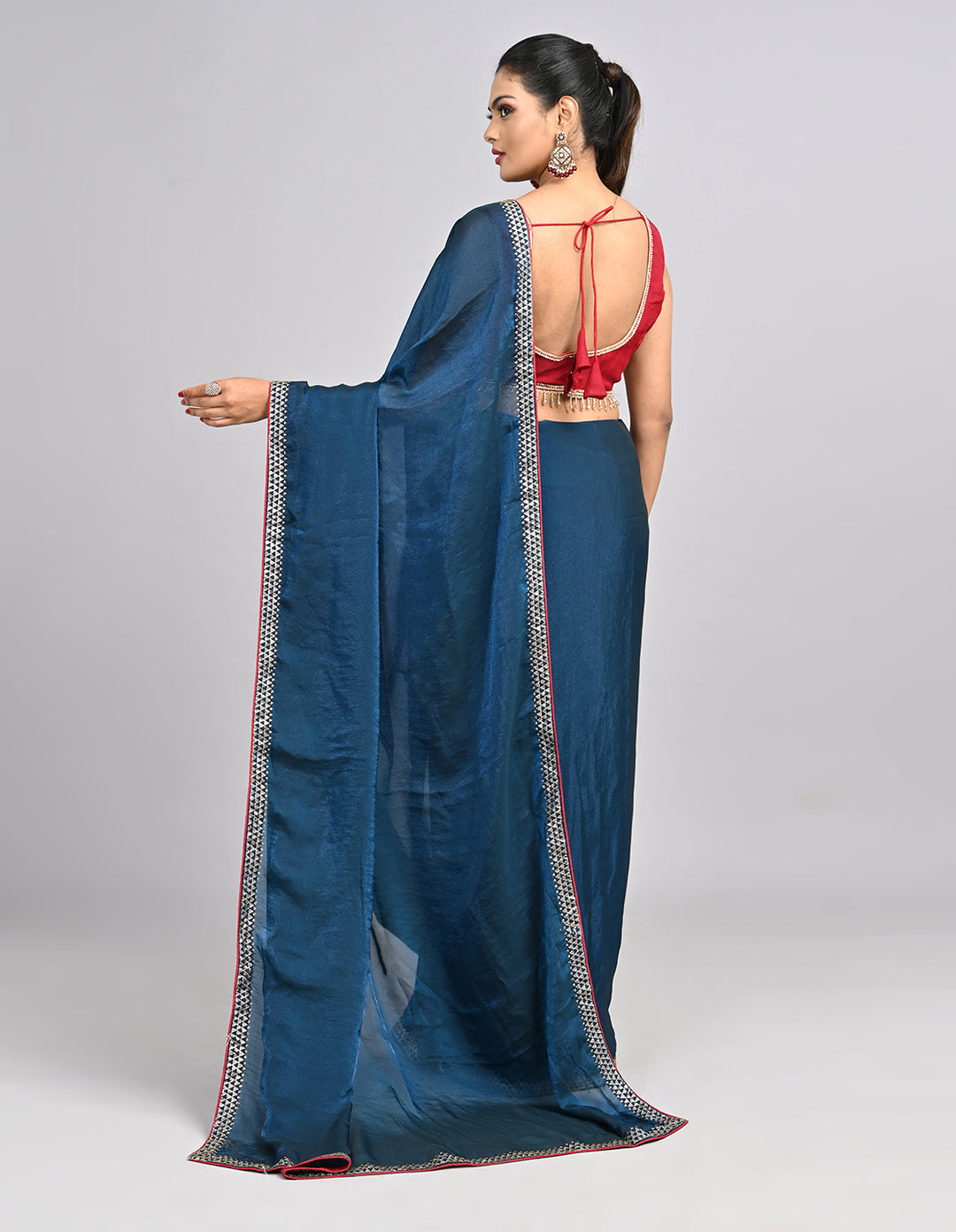 Zehra – Teal Blue Chinnon Saree with Swarovski Stone Border & Contrast Embroidered Blouse | Fazals