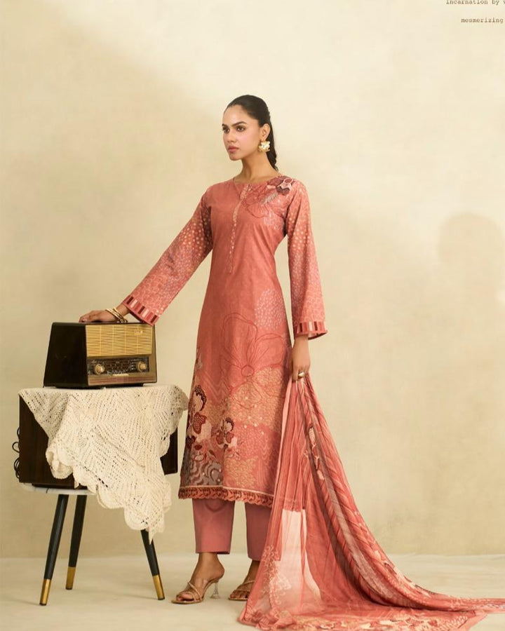 Fazals pink floral dress with a vintage radio in the background